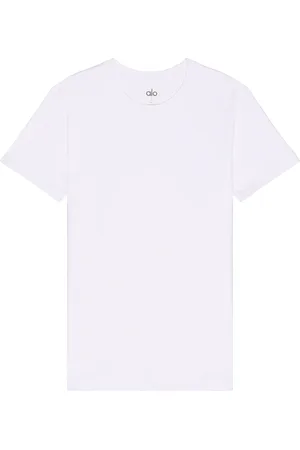 alo Conquer Reform Crewneck Short Sleeve T-shirt in White - White. Size L (also in M, S, XL/1X).