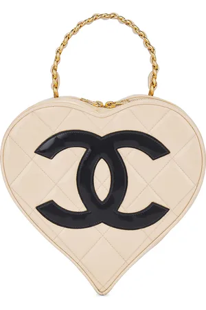 CHANEL Patent Leather Heart Bag in Beige - Beige. Size all.