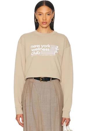 Sporty & Rich USA Wellness Club Crewneck Sweatshirt in Elephant - Tan. Size L (also in M, S, XL, XS).