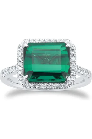 GOLDSMITHS Platinum Green Tourmaline and 0.25cttw Diamond Halo Ring