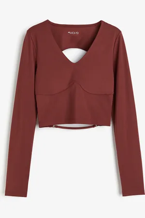 H&M H&M - Cropped sports top in SoftMove™