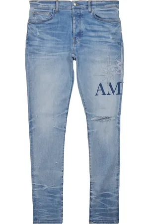 AMIRI Starburst-Appliqué Skinny Jeans