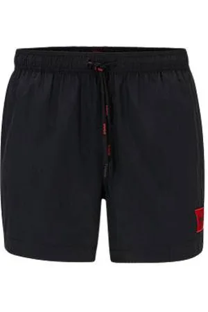 HUGO BOSS Fully lined swim shorts with red logo label