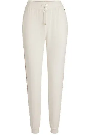 HUGO BOSS Monogram-detailed tracksuit bottoms with modal and silk