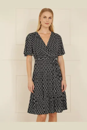 Yumi Geometric Print Mesh Dress