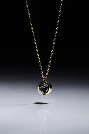 Karen Millen 14kt Gold Plated Hand Set European Crystal Solitaire Pendant