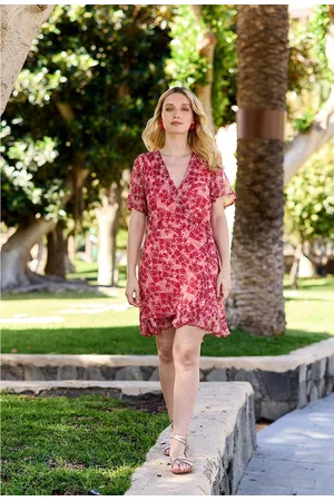 La Petite Etoile Resia Wrapover Mini Dress in Floral Print