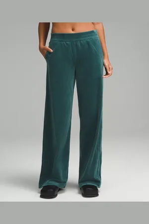 Mid-rise corduroy flared trousers - Woman