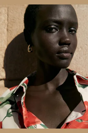 MANGO Twisted hoop earrings