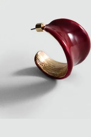 MANGO Earrings with wavy relief