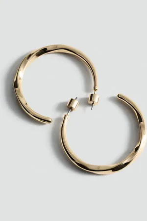 MANGO Twisted hoop earrings