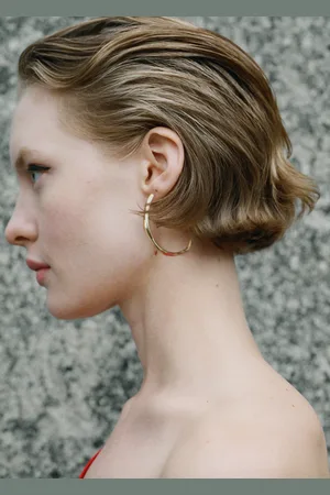 MANGO Twisted hoop earrings