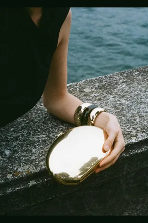 MANGO Metallic clutch handbag