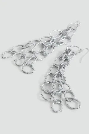 MANGO Long earrings with intertwined hoops