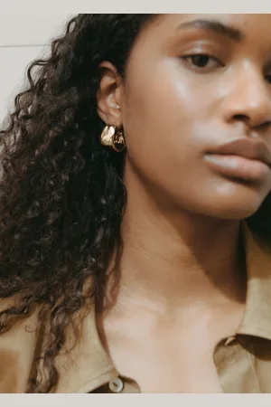 MANGO Twisted hoop earrings