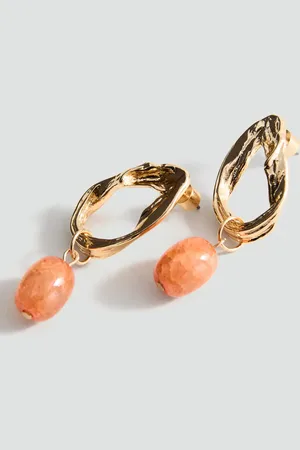 MANGO Circular bead-design earrings