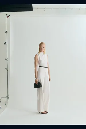MANGO Long jumpsuit with draped neck and belt