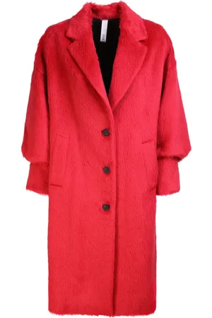 HEVO Santa Caterina coat by HevÃ². The brand evokes the history of Italian fashion with original and contemporary touches