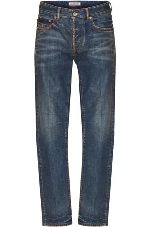 VALENTINO GARAVANI Distressed Denim Jeans