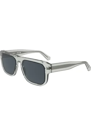 Calvin Klein Transparent Frame Sunglasses with Dark Grey Lenses