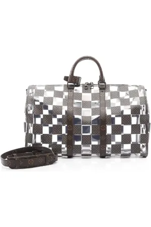 LOUIS VUITTON Pre-owned Canvas travel-bags