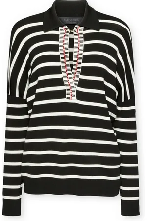 Elena Miro Polo to the right with embroidery