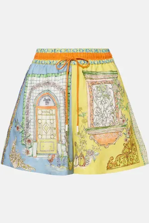 ALÉMAIS Monte printed high-rise linen shorts