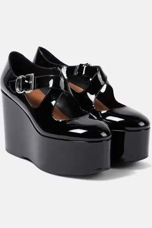 Alaïa AlaÃ¯a Criss Cross patent leather wedges
