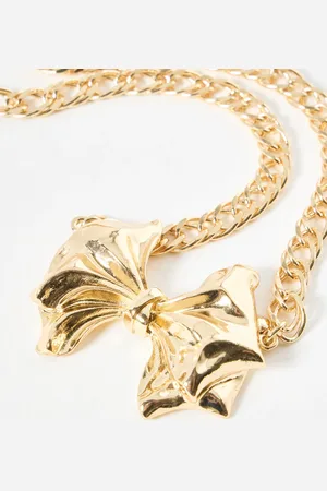 Oliver Bonas Misha Chunky Bow Tone Statement Necklace
