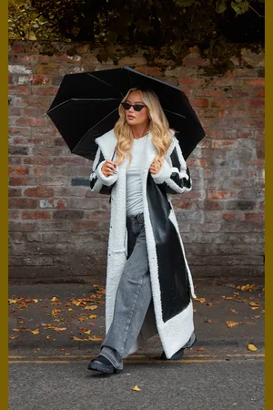 PRETTYLITTLETHING Faux Leather Oversized Lapel Borg Lined Belted Coat