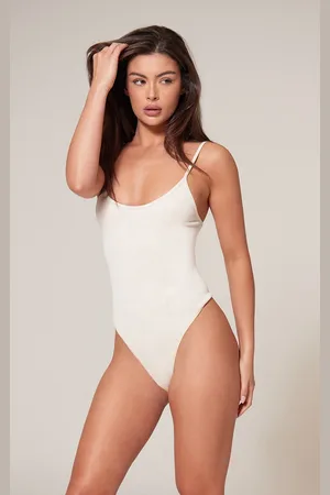 PRETTYLITTLETHING Cream Faded Contour Rib Strappy Bodysuit