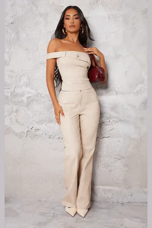 PRETTYLITTLETHING Petite Stone Faux Leather Zip Front Flared Trousers