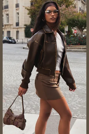 PRETTYLITTLETHING Bleach Detail Faux Leather Cropped Bomber Jacket