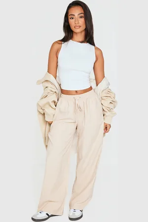 PRETTYLITTLETHING Petite Beige Peach Skin Cargo Trousers