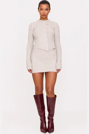 PRETTYLITTLETHING Soft Knit Asymmetric Popper Detail Mini Skirt