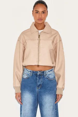PRETTYLITTLETHING Cream Bleach Detail Faux Leather Cropped Bomber