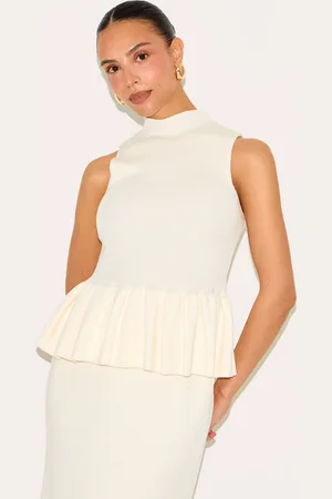 PRETTYLITTLETHING Petite Cream Knitted High Neck Peplum Hem Long Top