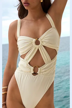 PRETTYLITTLETHING Cream O Ring Ruched Cut Out Swimsuit