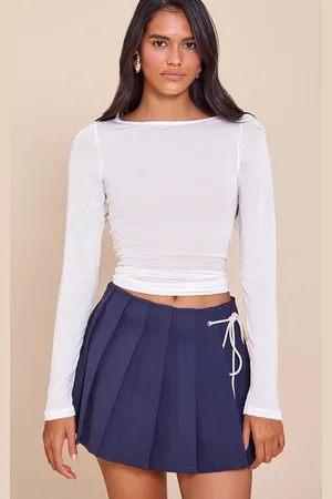 PRETTYLITTLETHING Navy Bow Detail Pleated Mini Skort