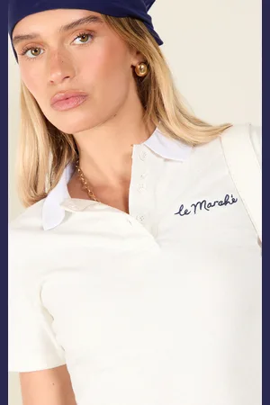 PRETTYLITTLETHING Cream Embroidered Le Marche Logo Fitted Polo Top