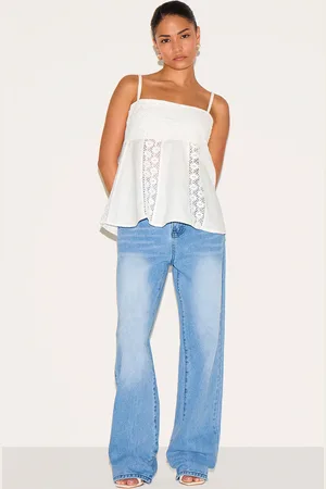PRETTYLITTLETHING Petite Denim Mid Rise Invisible Waistband Wide Leg Jeans
