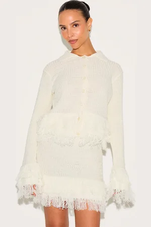 PRETTYLITTLETHING Petite Cream Rib Fringe Hem Knit Skirt