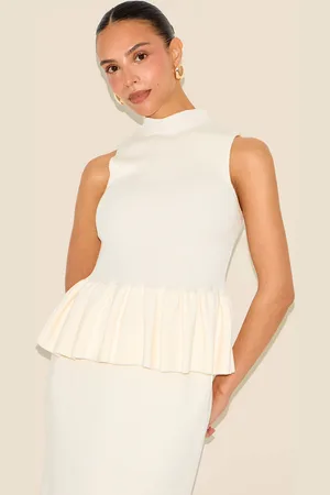 PRETTYLITTLETHING Petite Cream Knitted High Neck Peplum Hem Long Top