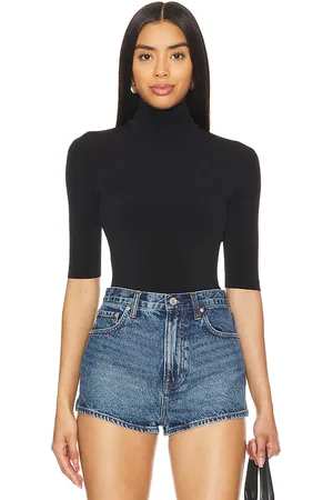 Norma Kamali Slim Fit Short Sleeve Turtleneck Top in . Size M, S, XL, XS.