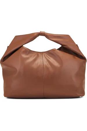 House of Sunny X REVOLVE Sling Bag in .