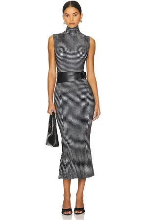 Norma Kamali Sleeveless Turtleneck Fishtail Dress in Black,White. Size M, S, XL, XS.