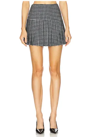 Norma Kamali Pleated Mini Skirt in Black,White. Size M, S, XS, XXS.