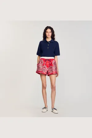 Sandro Polo shirt with decorative buttons