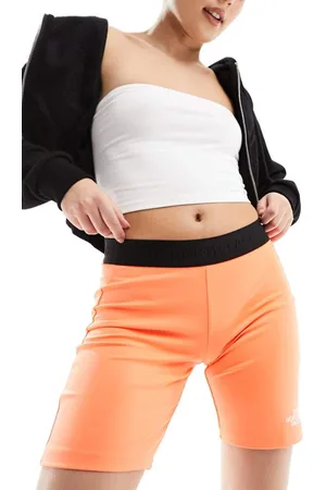 The North Face Womens Training Mountain Athletic bootie shorts in bright orange - - Size X-Small
