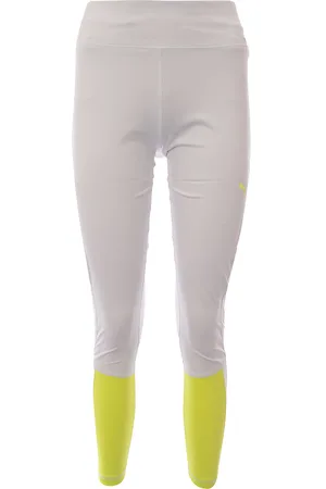 PUMA Womens Running Favourite Mid-Rise Leggings with Yellow Pop in - Size Small